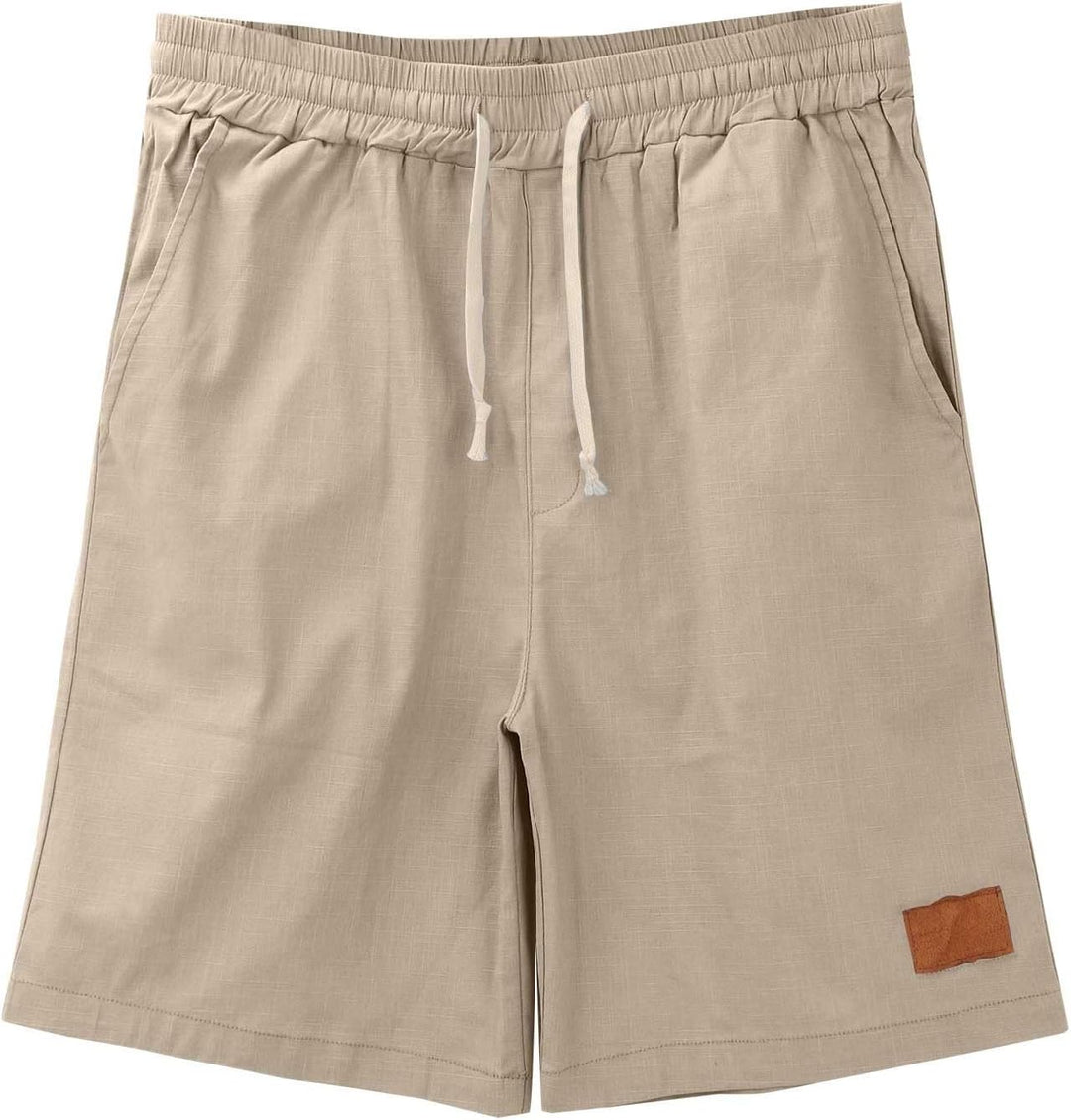 Short d'été homme bleu marine, léger et respirant, avec taille élastique pour un confort maximal.