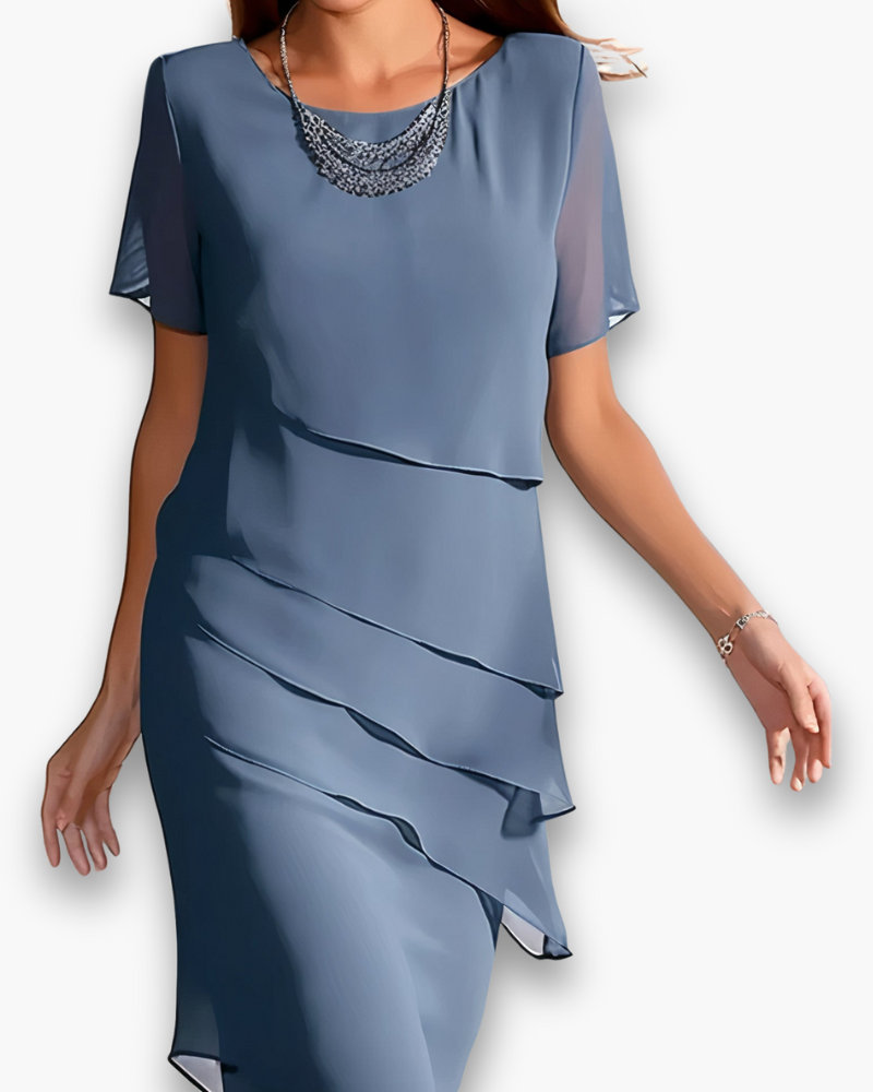 Robe de soirée chic pour femme, coupe midi raffinée. Idéale pour cérémonies de printemps et d'été. Vêtement élégant.