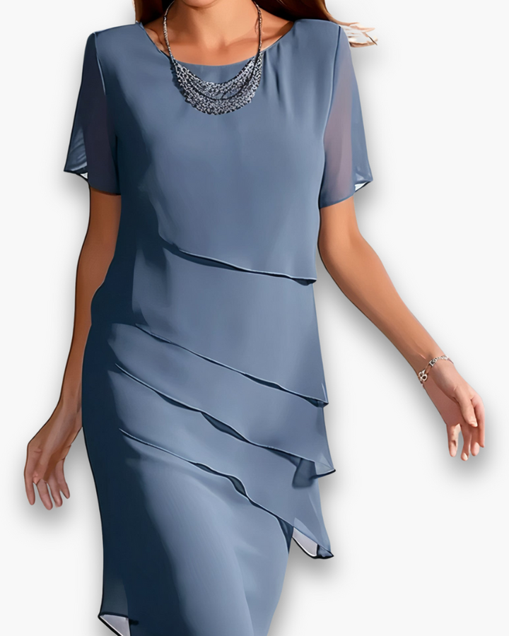 Robe de soirée chic pour femme, coupe midi raffinée. Idéale pour cérémonies de printemps et d'été. Vêtement élégant.