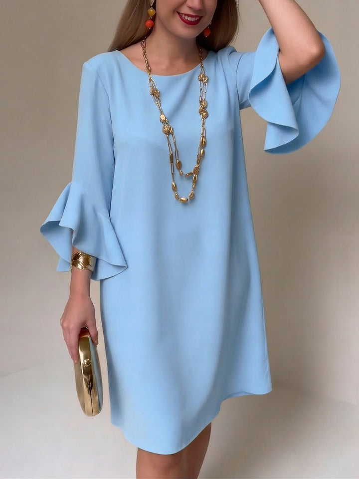 Élégante robe fluide femme aux manches volantées, un choix chic et ample pour le printemps et l'été. Très confortable.