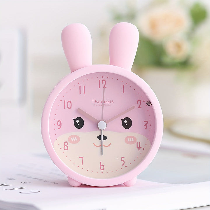 Réveil enfant BunnyTime silencieux lapin rose & jaune, avec veilleuse intégrée pour des matins doux et paisibles.