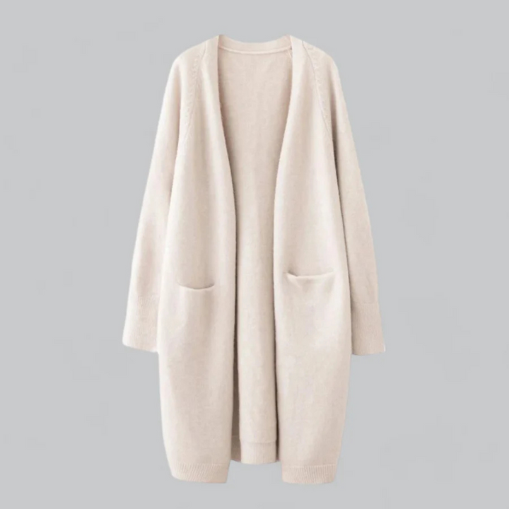 Cardigan long élégant pour femme avec poches, idéal pour un look décontracté ou habillé en hiver.