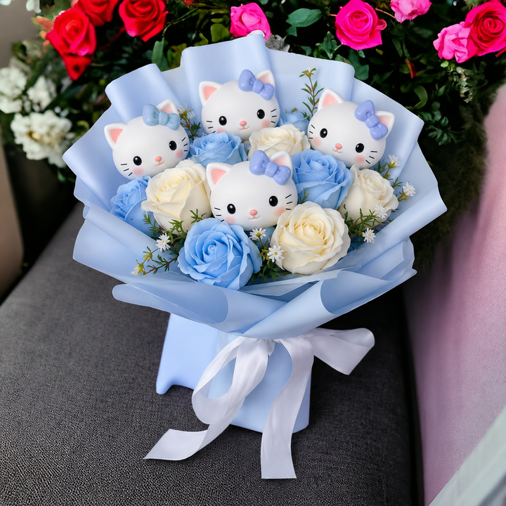 Cadeau d'anniversaire fantaisie : bouquet de fleurs synthétiques colorées avec adorables chatons, décoration joyeuse.