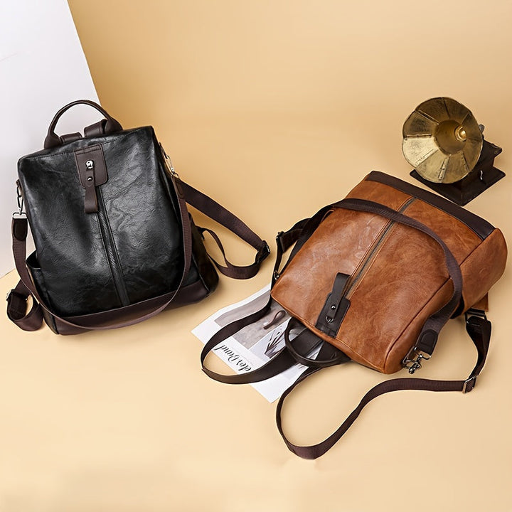 Sac à dos femme antivol en PU végétalien, nombreux compartiments, idéal pour voyager en sécurité et organisé.
