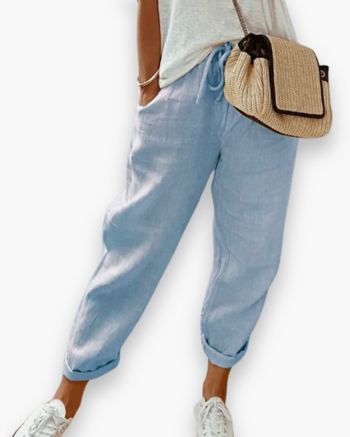 Pantalon fluide femme, coupe ample et matière légère. Confortable, style décontracté parfait pour l'été.