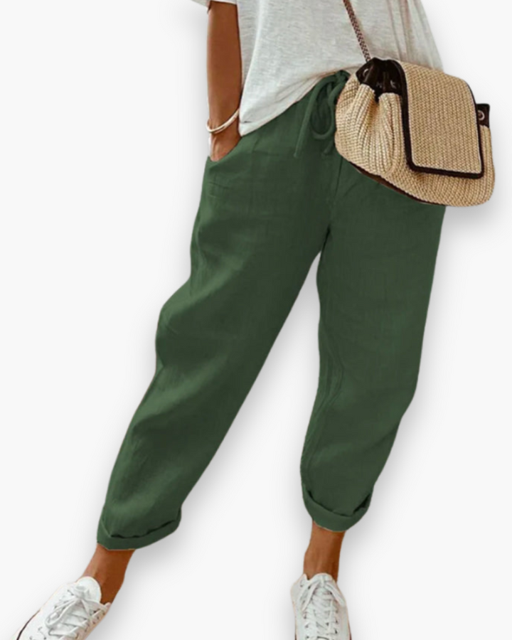Pantalon confortable femme, coupe ample et fluide. Taille élastique pour un style décontracté et chic.