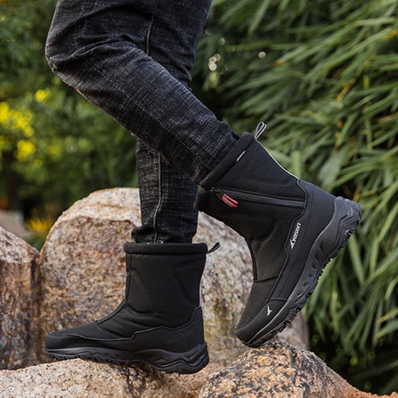 Bottes d'hiver pour hommes, mode masculine. Fermeture éclair pratique, style élégant et chaud.