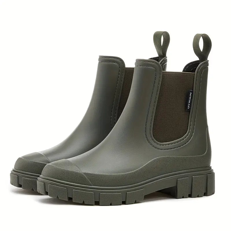 Bottes Chelsea femme mode, avec design intemporel et protection imperméable pour un style urbain chic.