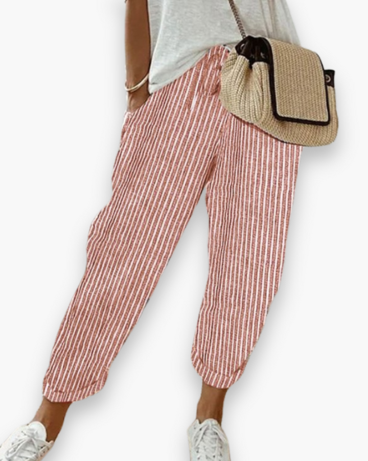 Pantalon femme fluide et ample, tombé élégant. Confortable avec taille élastique, style décontracté mode.