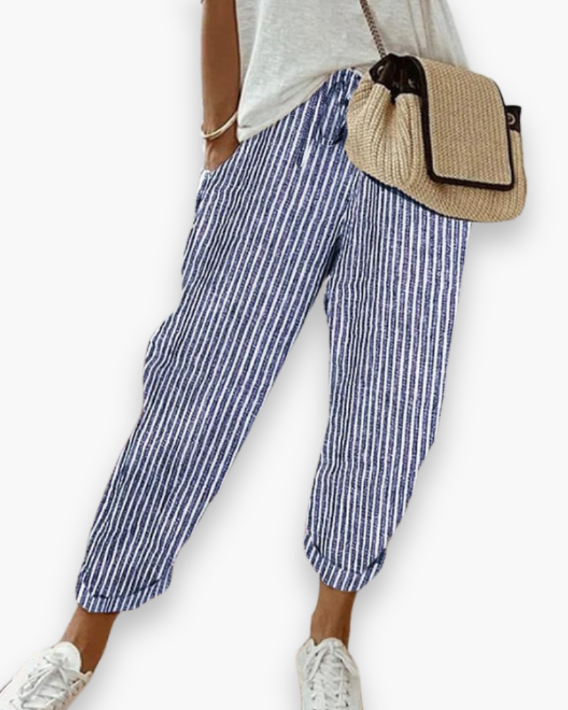 Pantalon ample femme, fluide et polyvalent. Confort décontracté pour un style estival et moderne.