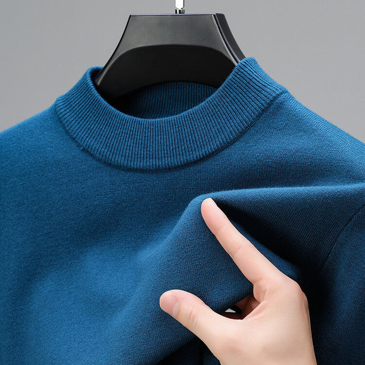 Vêtement homme confortable et chaud, ce pull est parfait pour un style décontracté en toute saison froide.
