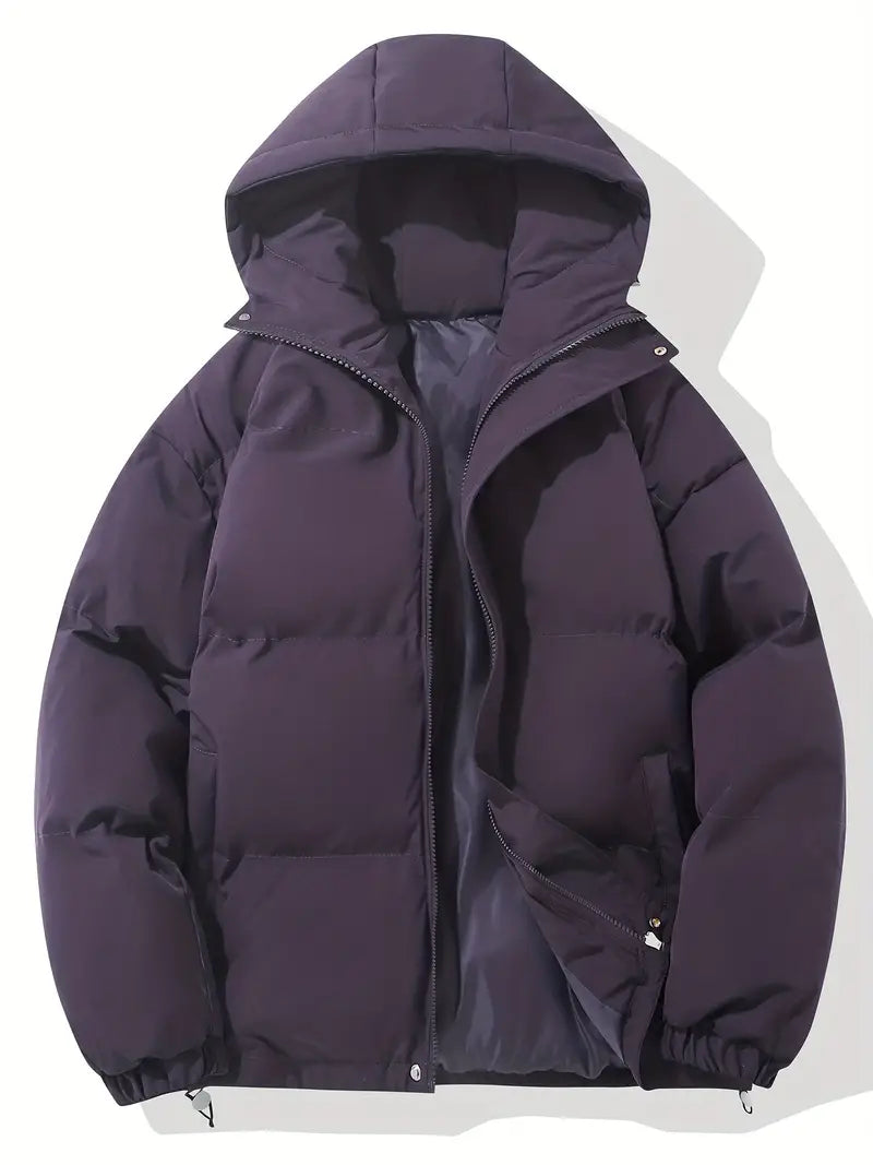 Manteau matelassé à capuche pour homme, alliant style contemporain et chaleur optimale en hiver.