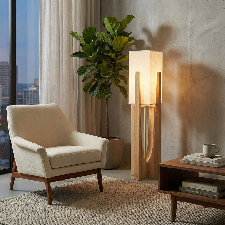 Luminaire sur pied design japonais, bois clair et tissu beige, diffuse une lumière douce et reposante.