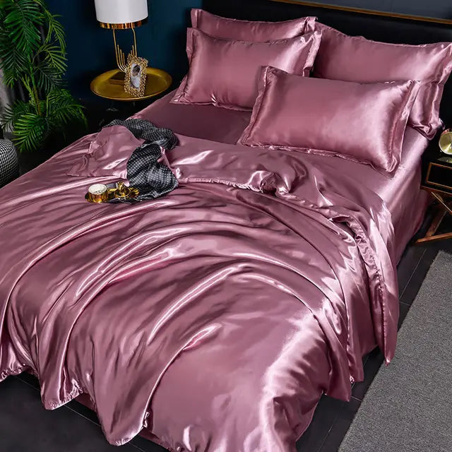 Housse de couette en satin résistante et luxueuse, pour une literie durable, un confort optimal et une touche déco.