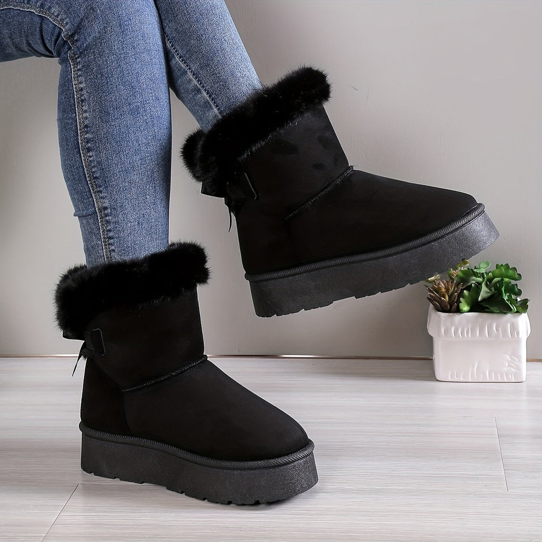 Bottes neige femme, style chic et grande adhérence. Des chaussures d'hiver confortables et sécurisées.