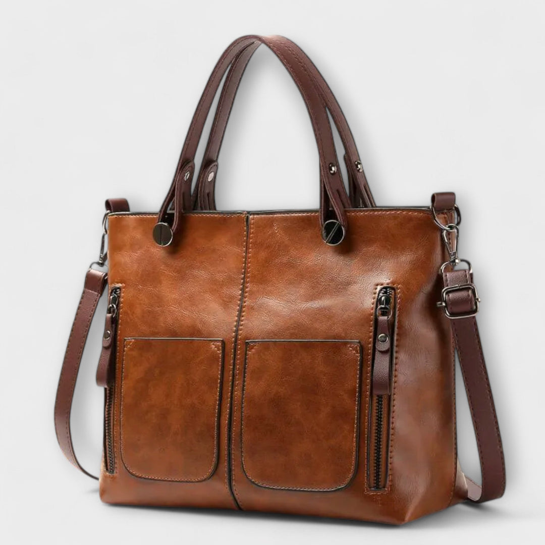 Sac à main élégant femme en cuir marron. Design moderne, accessoire mode polyvalent pour toutes occasions.