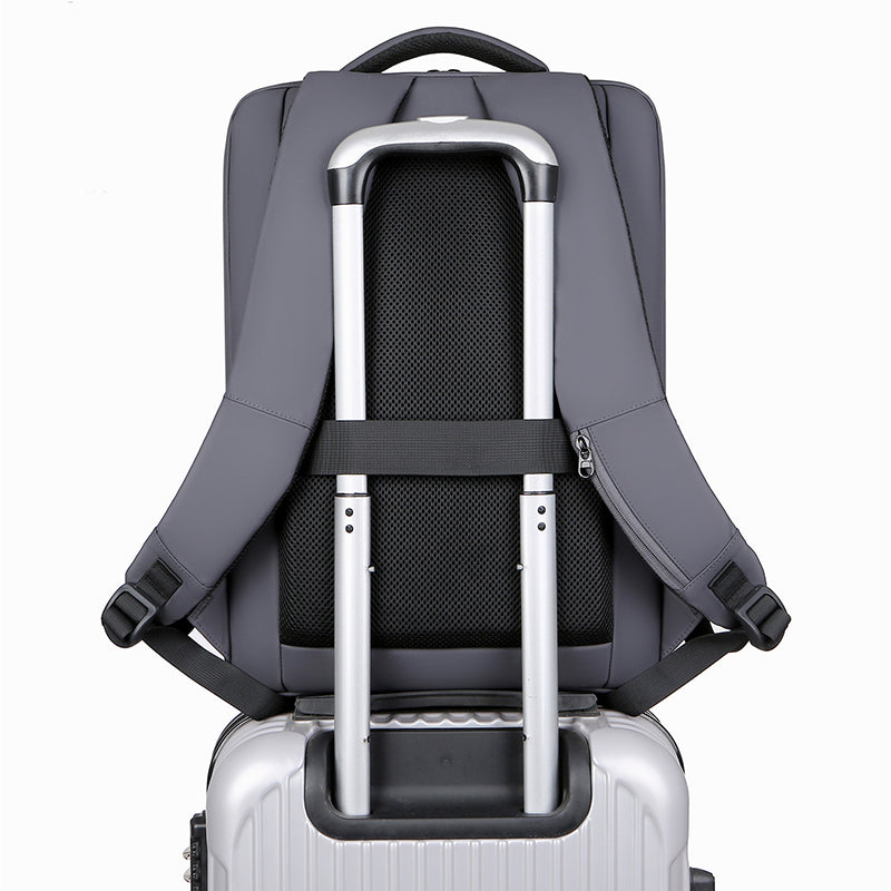 Sac à dos de voyage et bureau unisexe gris, doté de nombreuses fonctionnalités d'organisation pour professionnels.