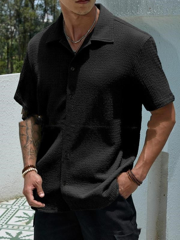 Chemise estivale homme, style moderne décontracté, manches courtes, un haut tendance pour la plage.