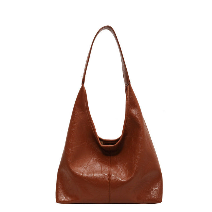 Sac élégant en cuir vegan pour femmes, avec pochette, accessoire parfait pour toutes occasions.