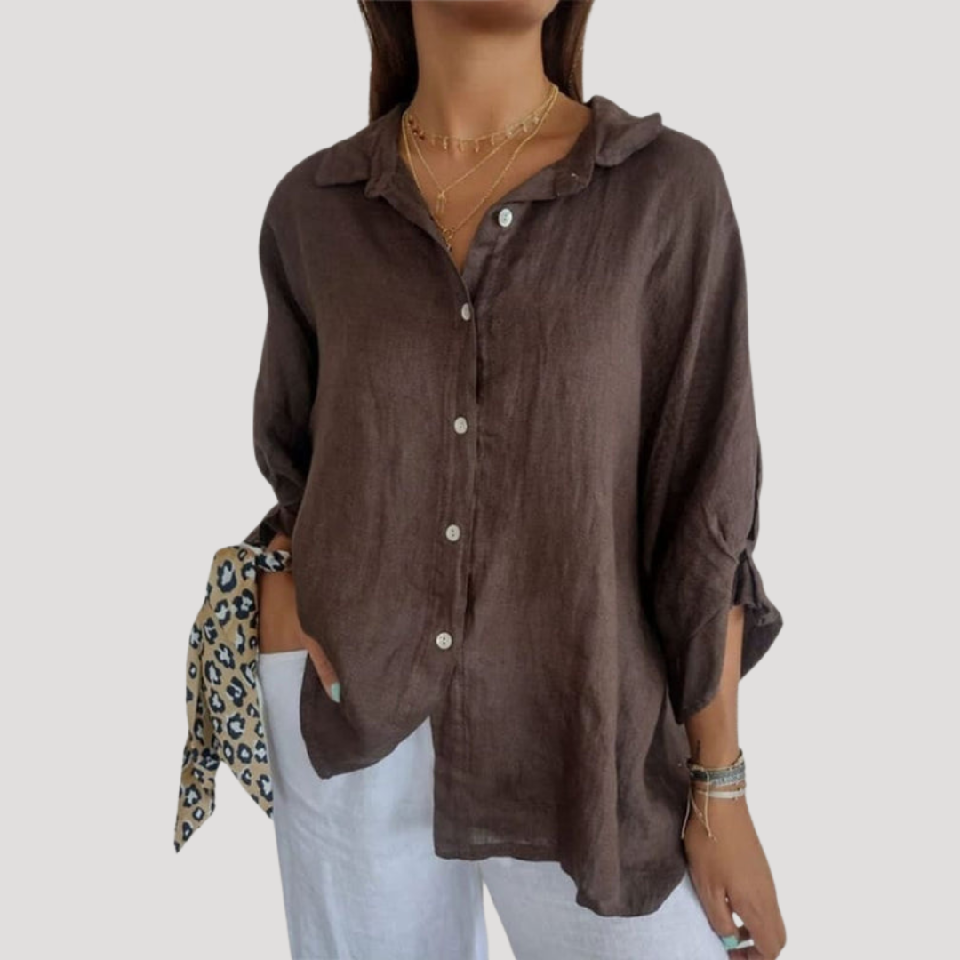 Vêtement féminin: Blouse fluide ample à manches longues, polyvalente pour un look chic ou décontracté.