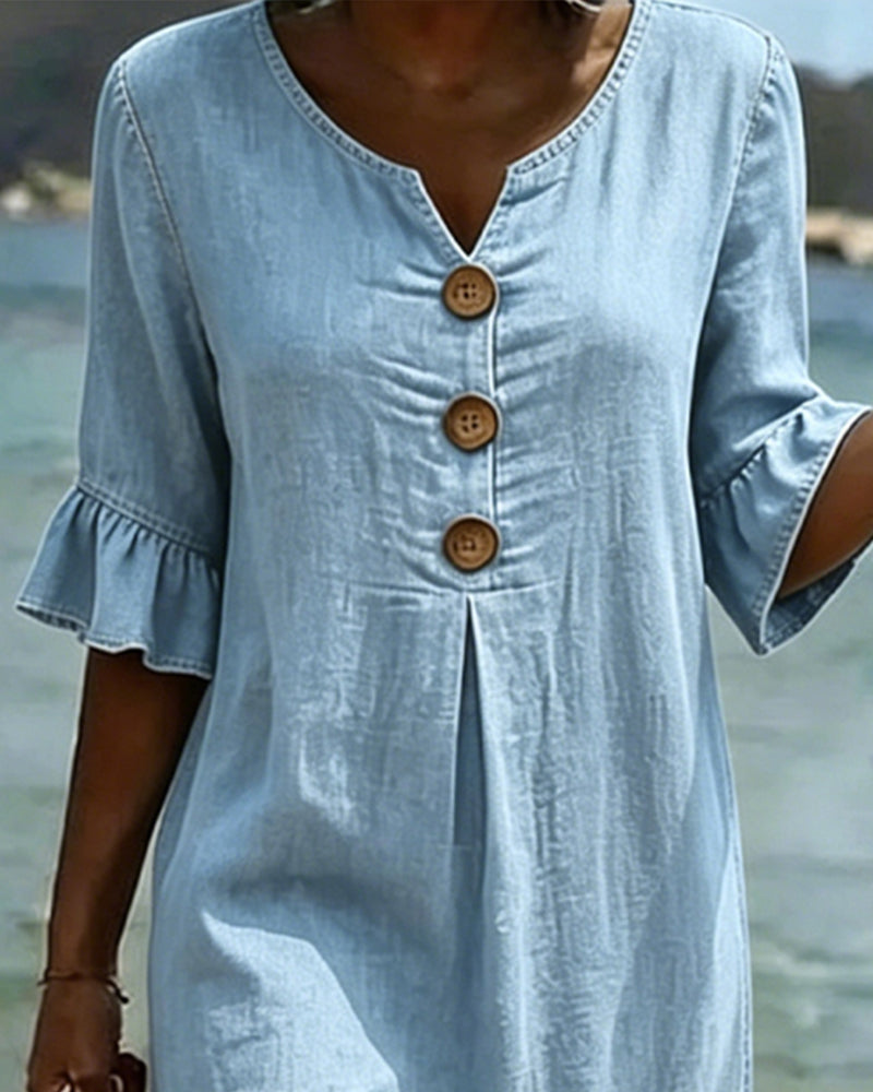 Robe fluide pour femme avec manches volantées, idéale pour les journées chaudes d'été.