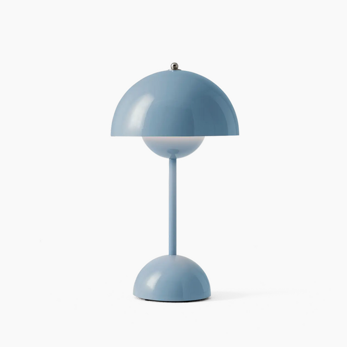 Lampe de table LED Aurora design, technologie sans fil, éclairage intérieur contemporain.