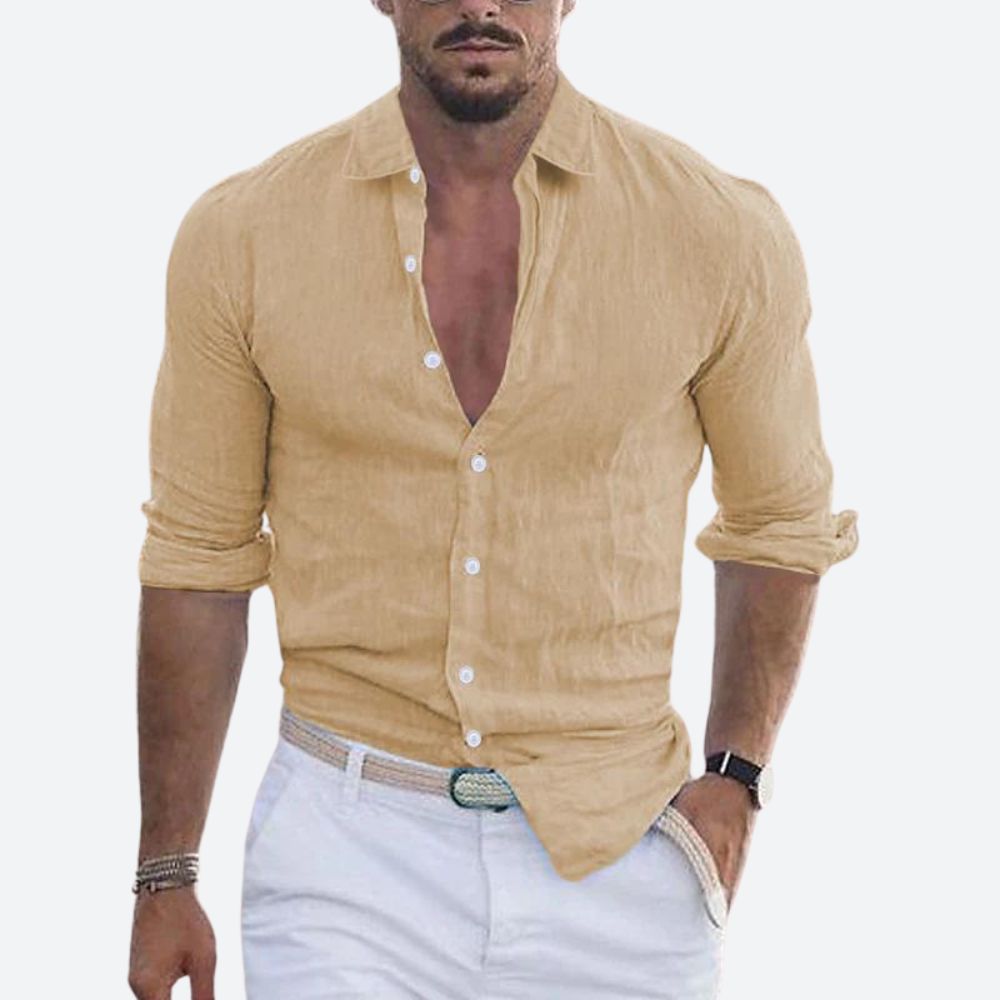 Chemise homme à coupe ample, décontractée, col rabattu, pour un look estival confortable, élégant et moderne.