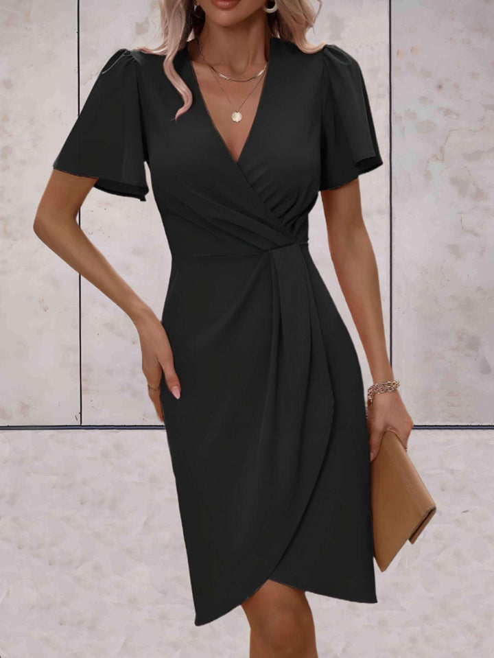 Robe portefeuille femme, col en V, coupe ajustable. Confortable et élégante toute l'année.