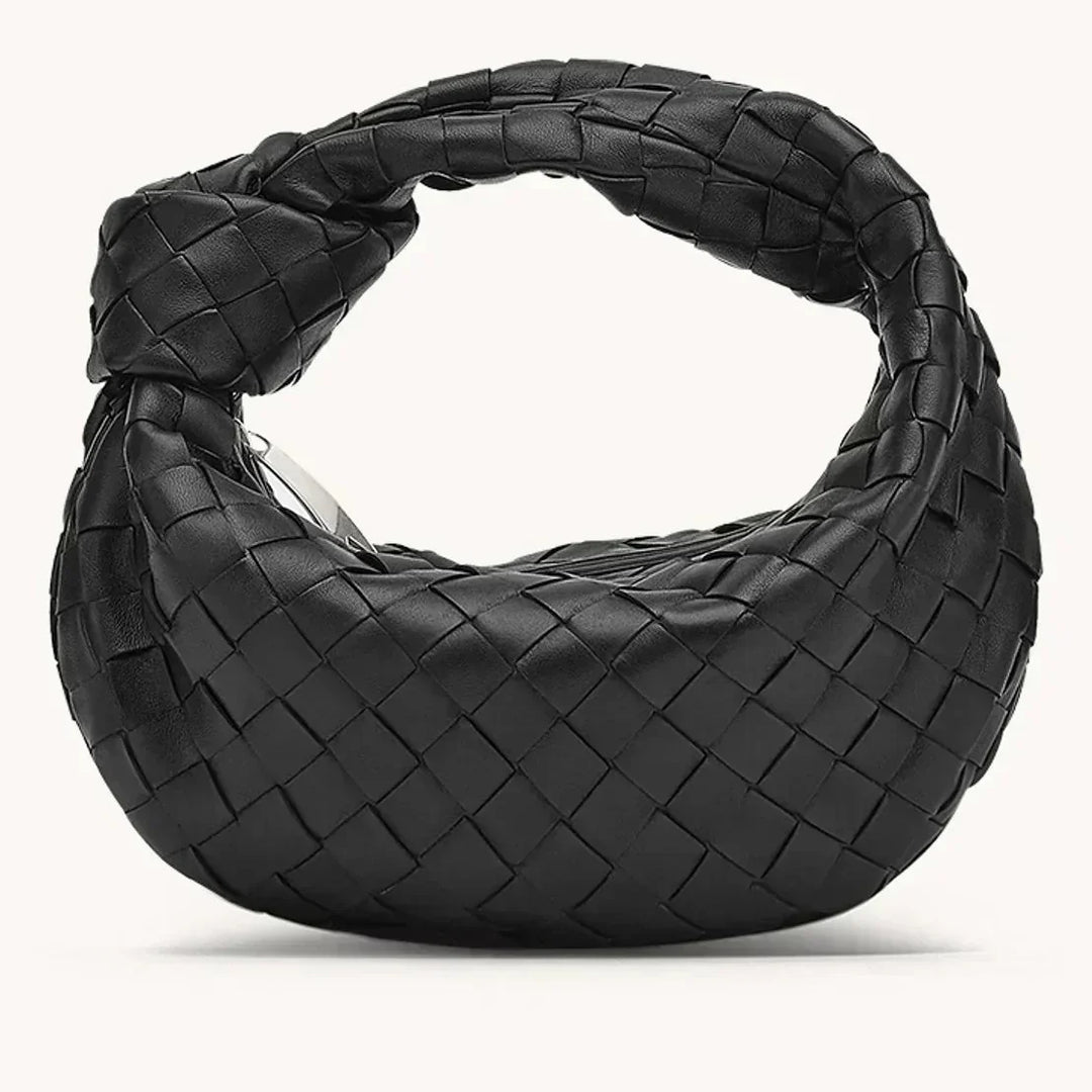 Sac quotidien femme en cuir de haute qualité, style intemporel. Très fonctionnel avec bandoulière.