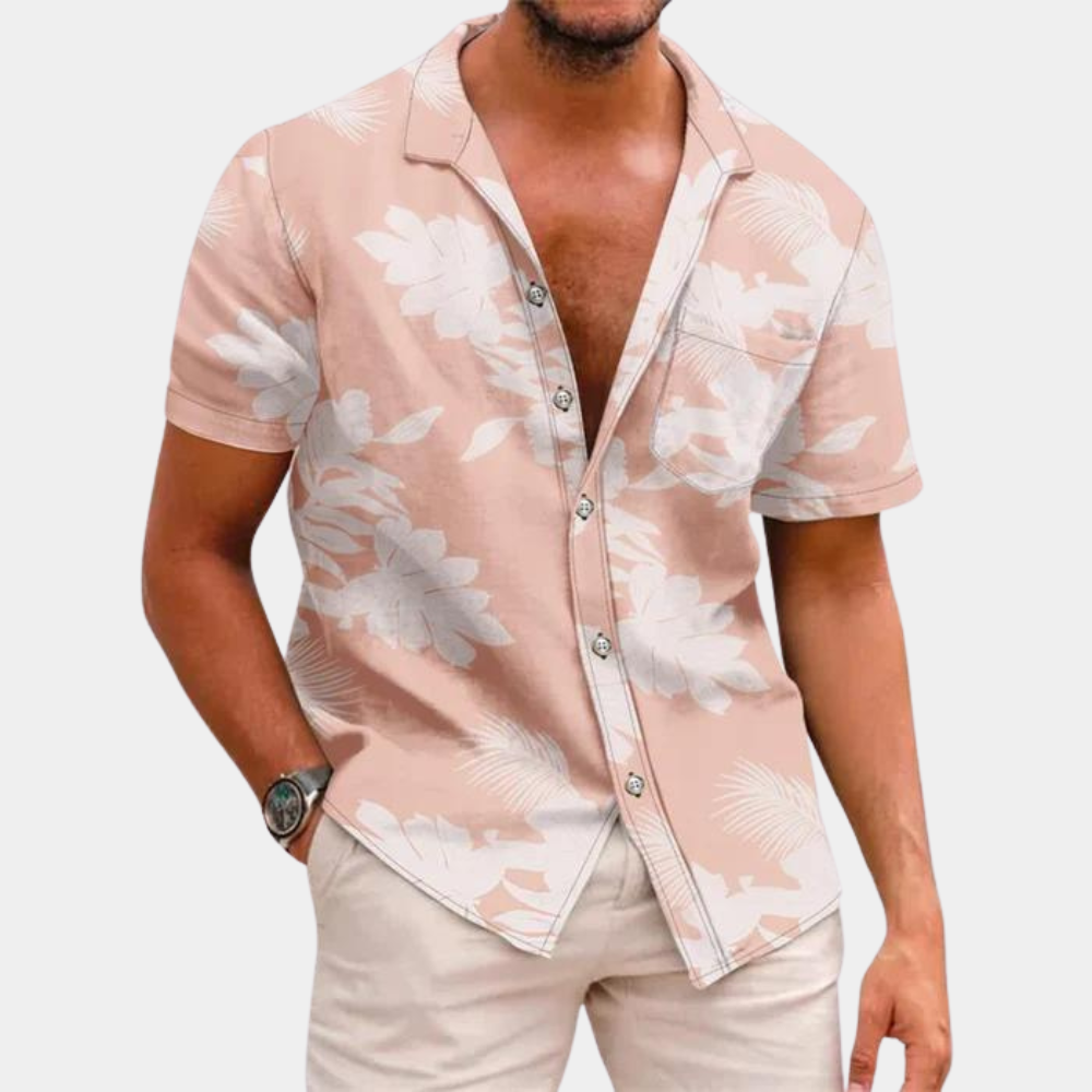 Chemise homme fleurie à manches courtes pour un style estival décontracté. Imprimé floral léger.