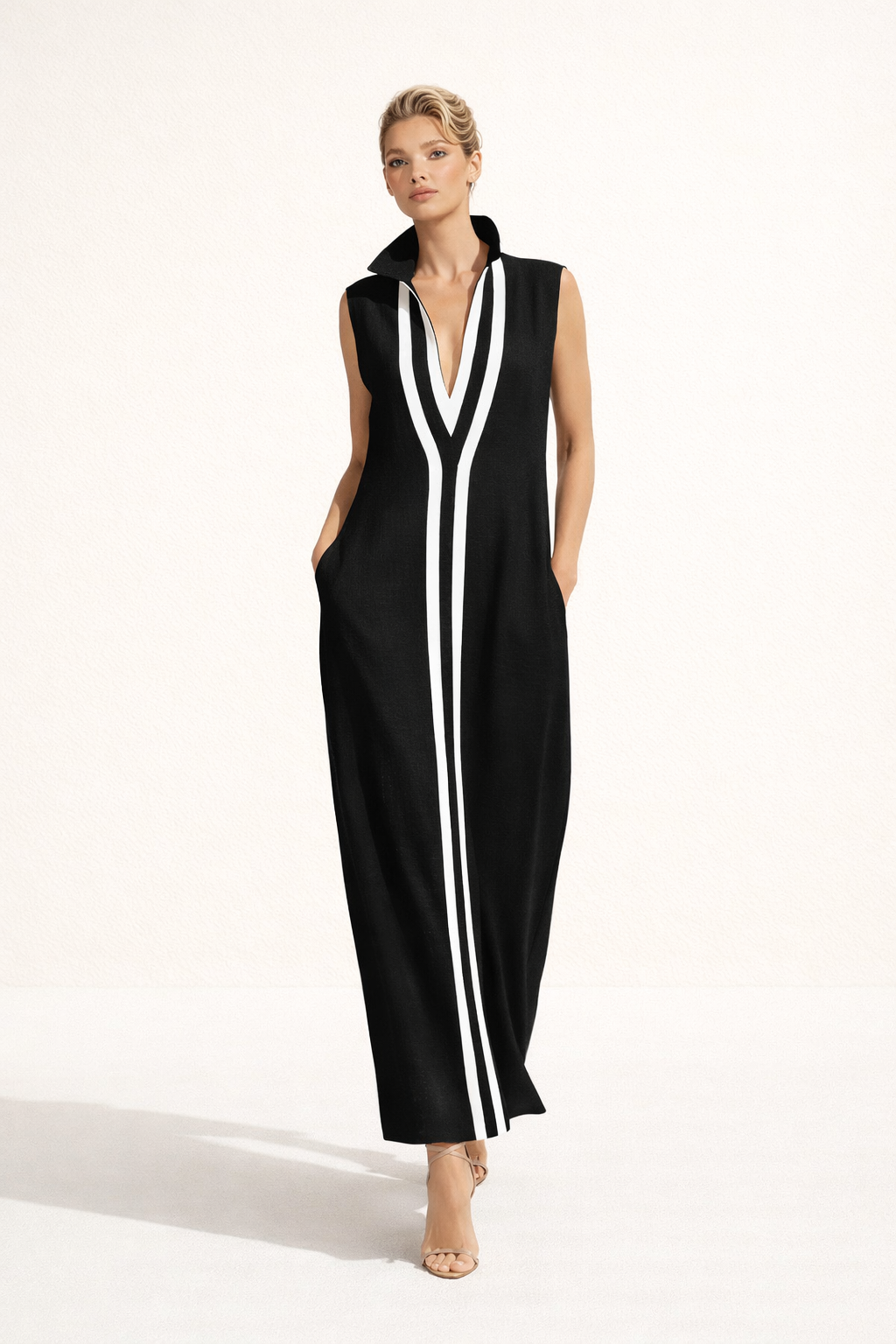 Robe longue femme élégante à décolleté V, idéale pour l'été ou le printemps, look chic et fluide.