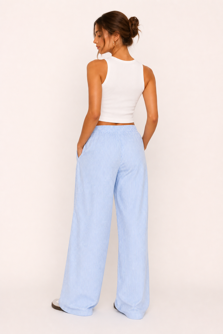 Pantalon rayé ample pour femme, style décontracté et élégant. Parfait pour le printemps et l'été.