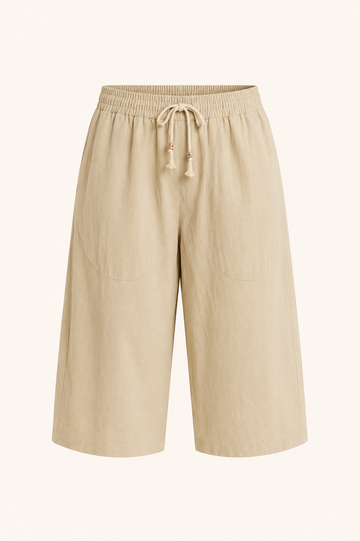 Pantalon homme court décontracté avec taille élastique, offrant confort et style pour l'été.