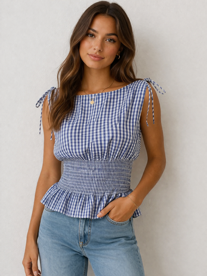 Top femme bleu vichy nid d'abeille avec nœud, style rétro chic d'été. Idéal pour une tenue casual élégante.