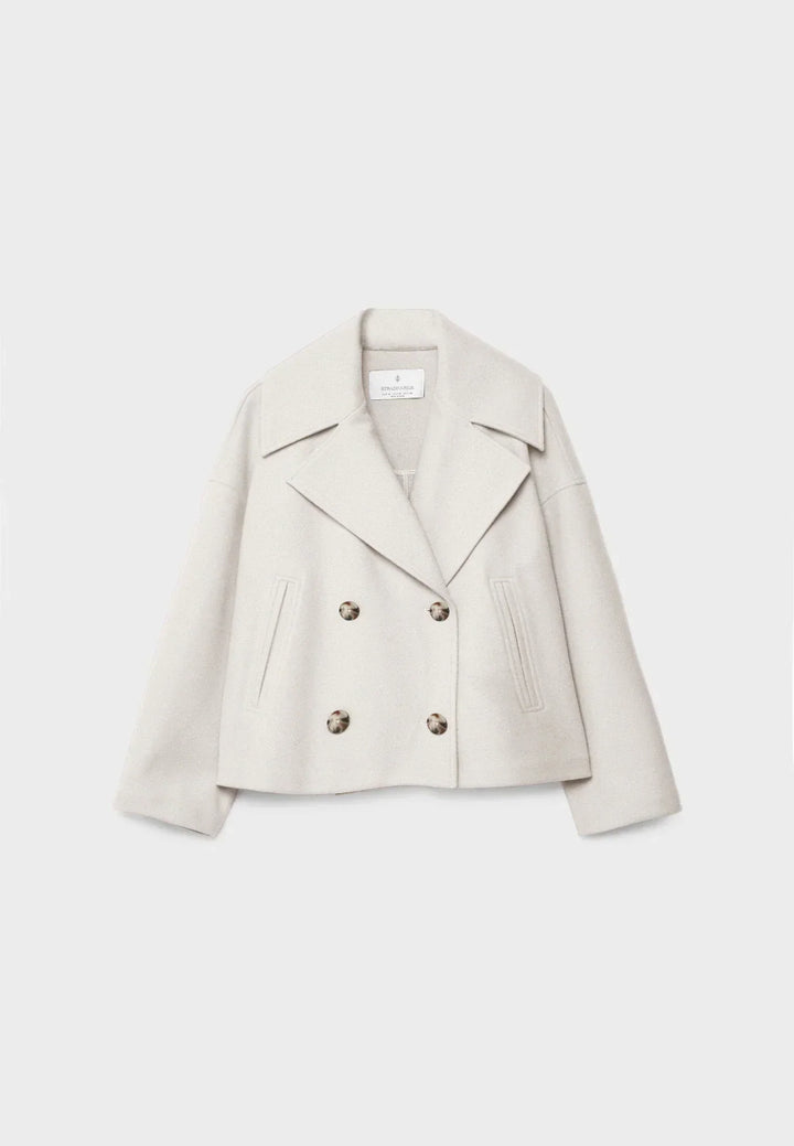 Veste courte femme chic à double boutonnage, élégante pour printemps-automne, mode urbaine.