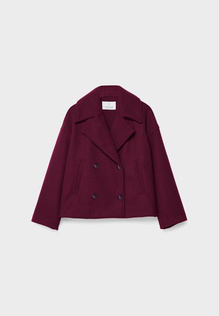 Veste courte femme, double boutonnage, élégante et chic, pour un style urbain sophistiqué.