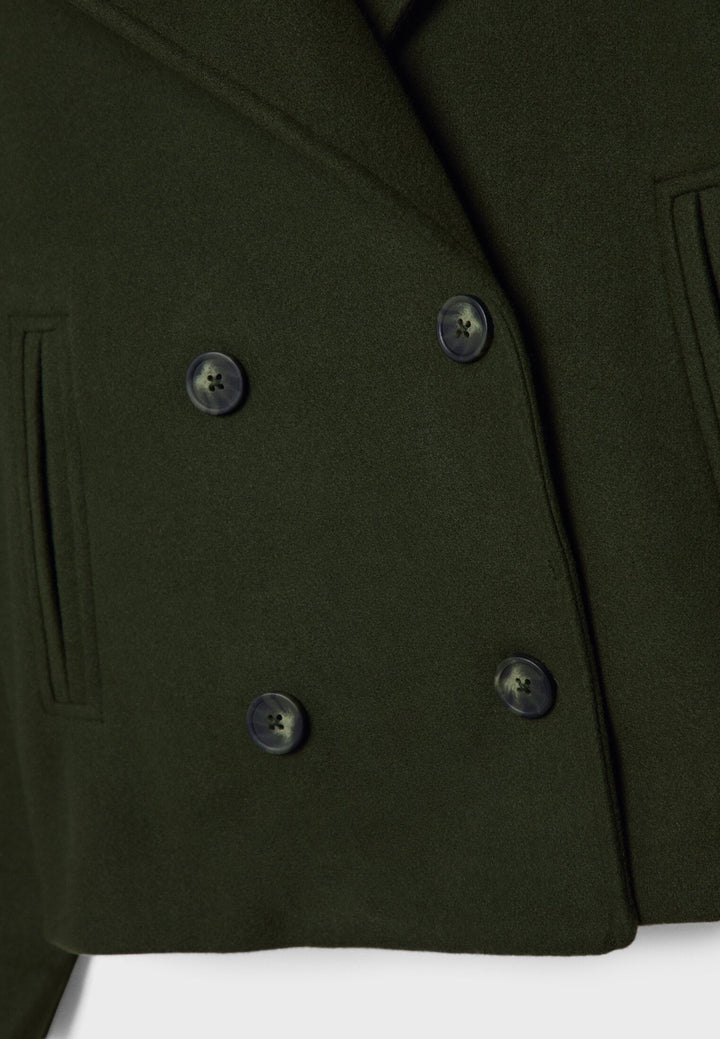 Veste courte femme à double boutonnage, élégante et moderne, pour un style chic au quotidien.