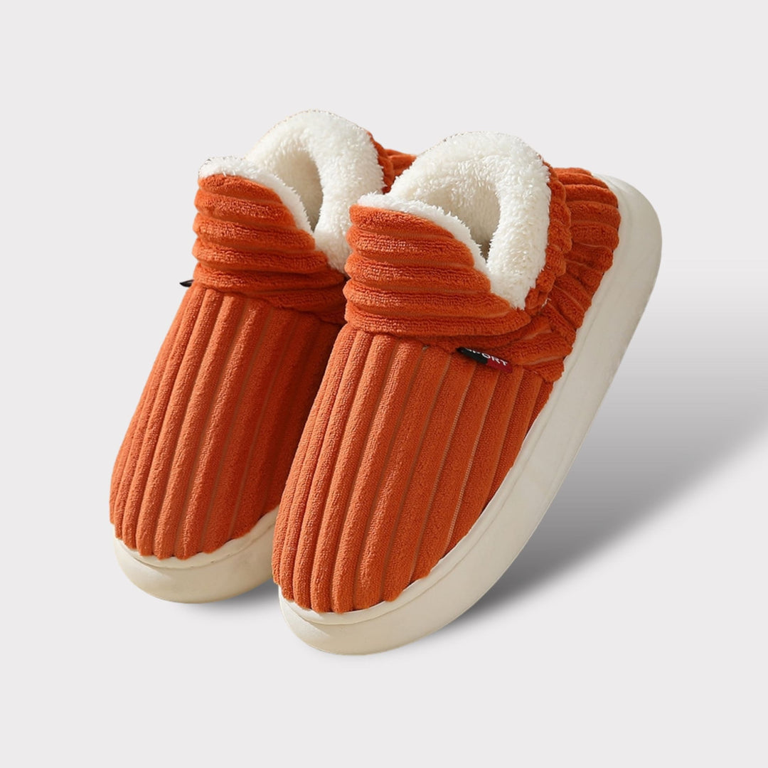 Pantoufles hiver ComfyCush ultra-douces, offrant confort et chaleur pour femmes et hommes.