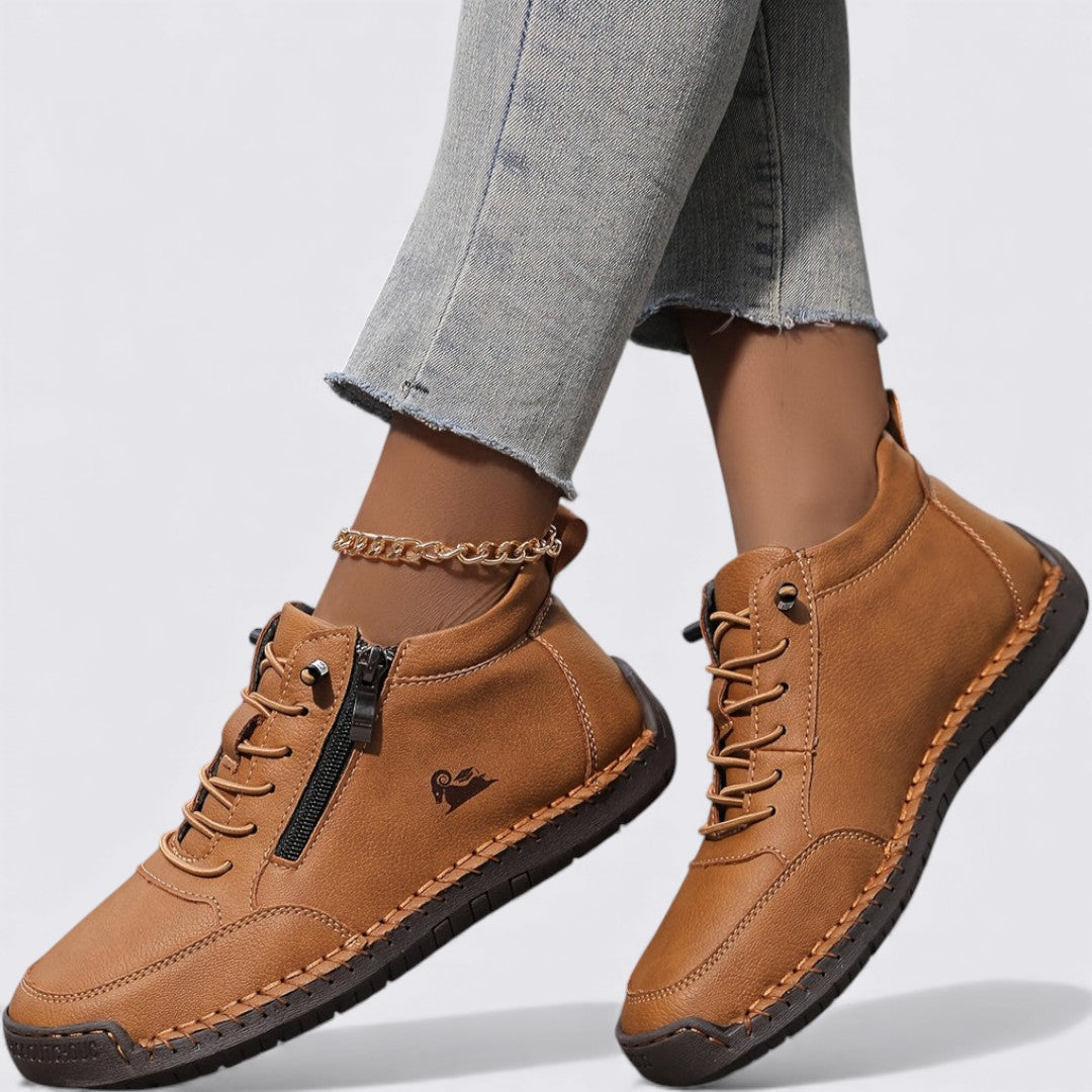 Bottines femme noires à fermeture glissière, confortables et tendance pour l'automne et l'hiver.