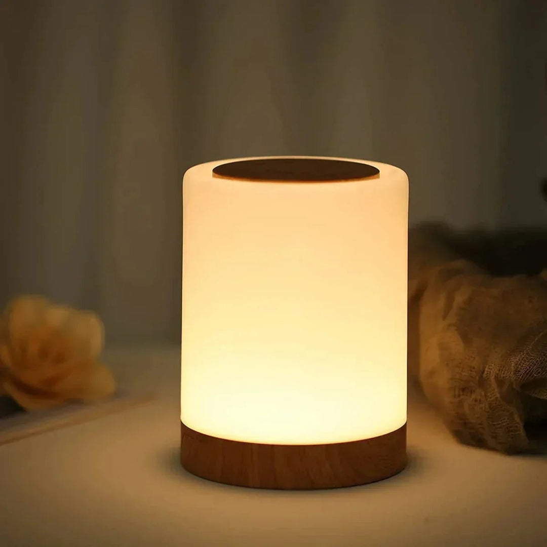 Lampe LED de table sans fil portable, dimmable, rechargeable, idéale pour éclairage d'ambiance moderne.
