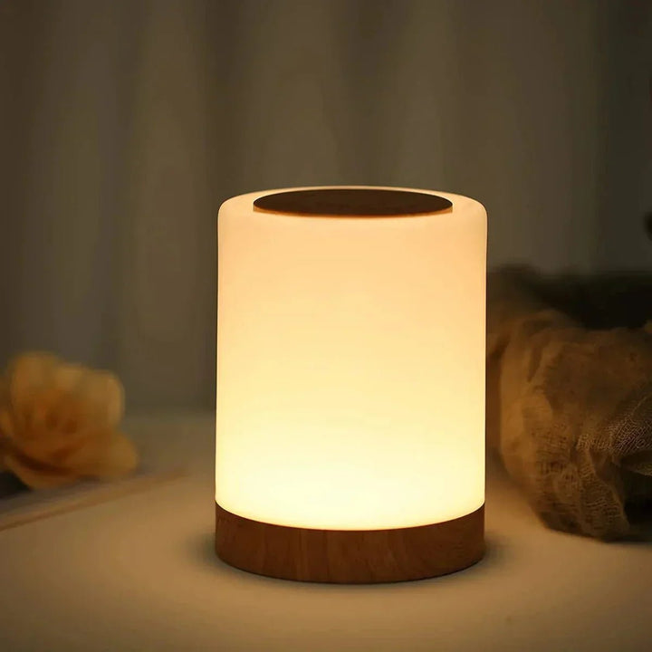 Lampe LED de table sans fil portable, dimmable, rechargeable, idéale pour éclairage d'ambiance moderne.