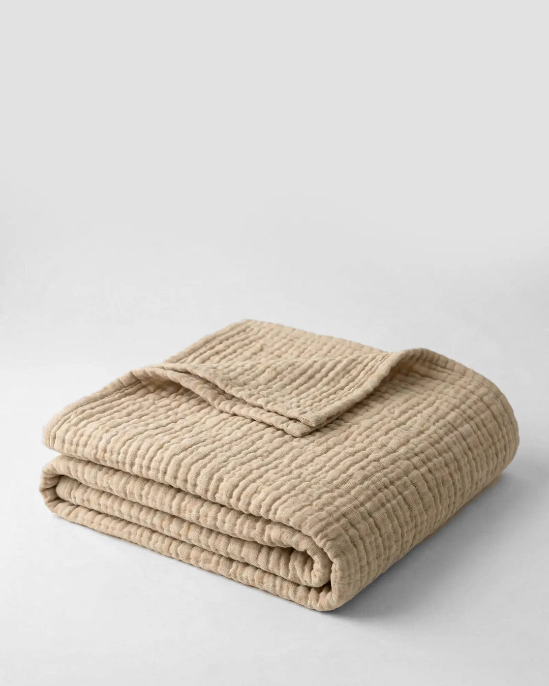 Plaid en mousseline de coton naturel, doux et respirant pour lit ou canapé, idéal toutes saisons.