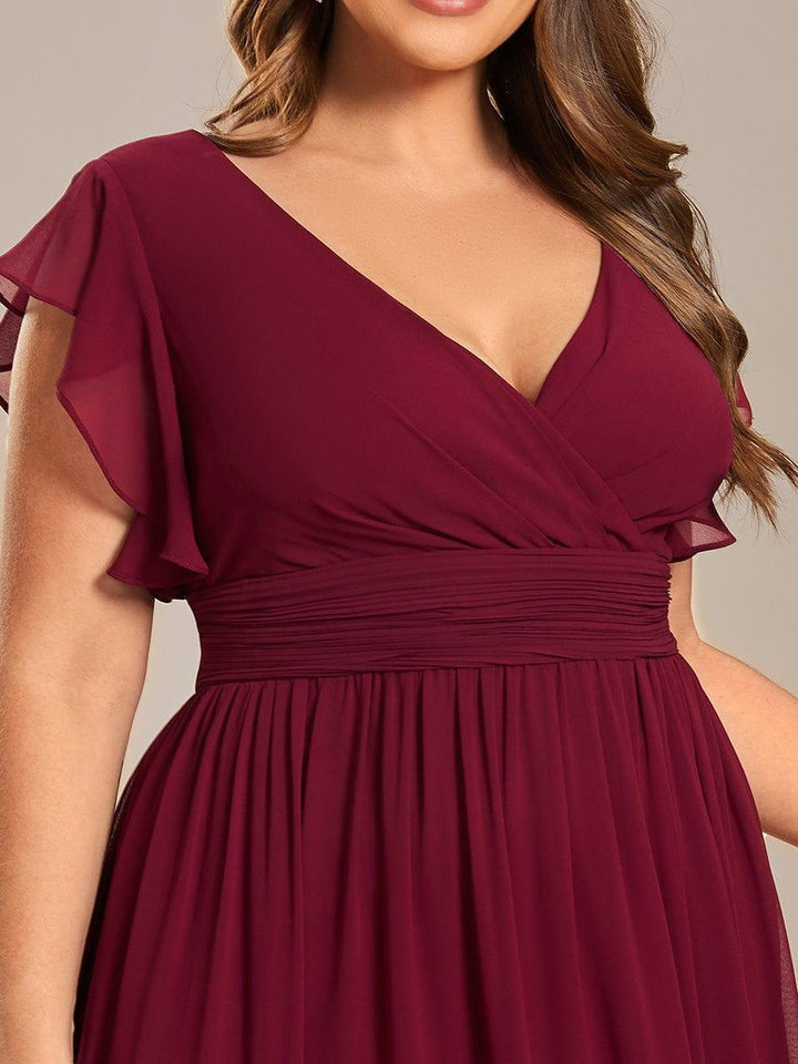 Robe maxi fluide, parfaite pour demoiselle d'honneur. Élégante, manches courtes et dos ouvert.