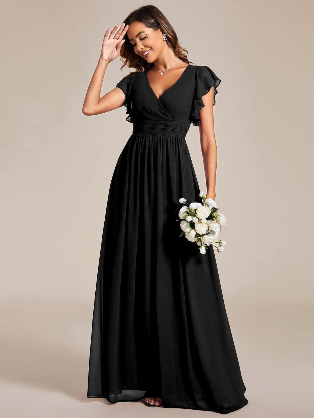 Robe de fête élégante, dos ouvert, manches courtes. Fluide et longue pour l'été.