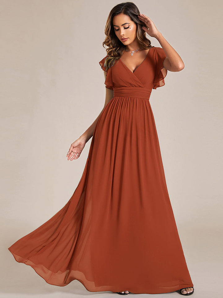 Robe de fête chic, dos ouvert, col en V, longueur maxi. Confortable et fluide pour toute femme.