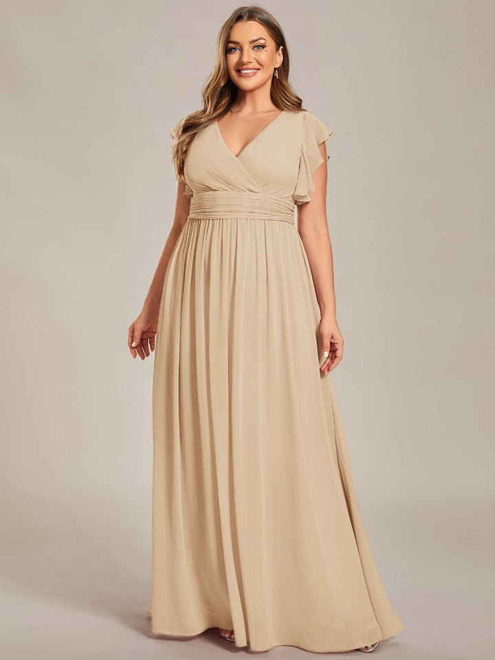 Robe fluide, dos ouvert, col en V, longueur maxi. Élégante pour demoiselle d'honneur de mariage.