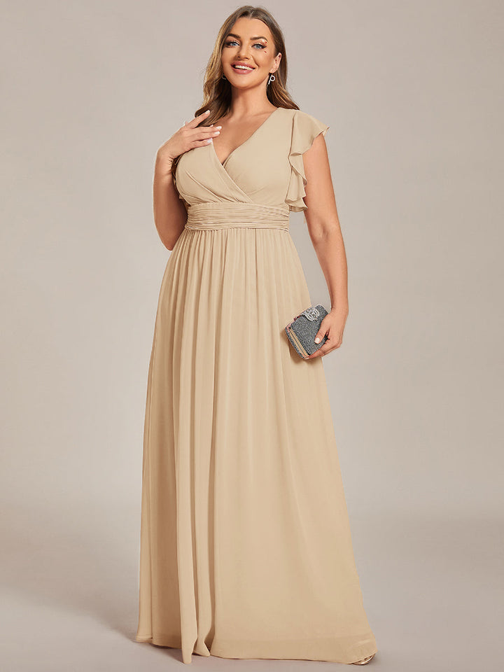Robe de cérémonie femme, dos ouvert, col en V. Longue et fluide, parfaite pour le printemps.