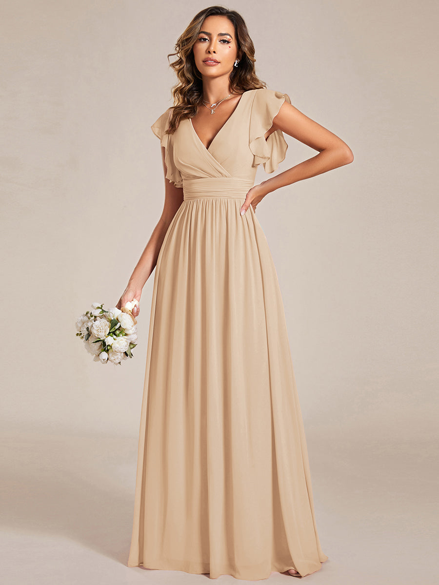 Robe longue femme, dos ouvert, manches courtes. Élégante pour cérémonie ou soirée d'été chic.