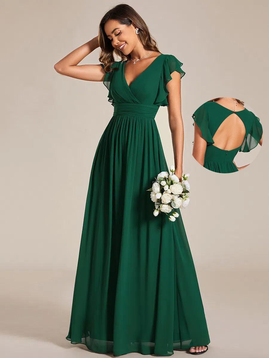 Robe de demoiselle d'honneur longue, élégante, avec dos ouvert pour un mariage champêtre.