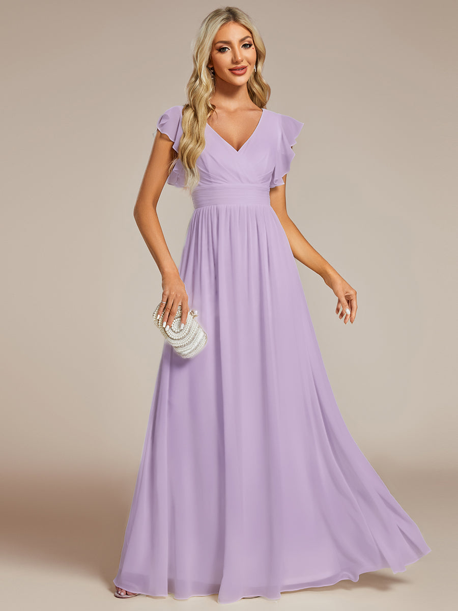 Robe longue femme, dos ouvert, manches courtes. Élégante pour une soirée ou un mariage d'été en toute beauté.